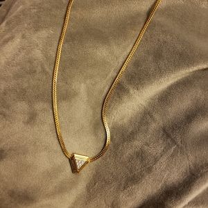Diamond triangle necklace.